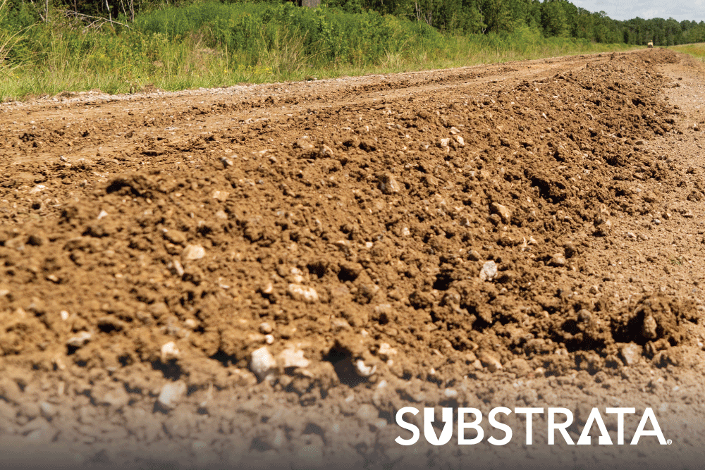 Soil on an unpaved road that could need a CBR test