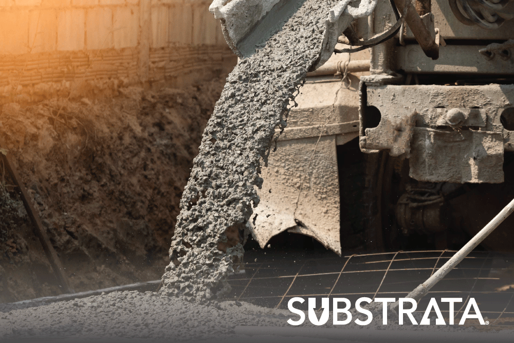 Mixer truck pouring concrete that contains portland cement