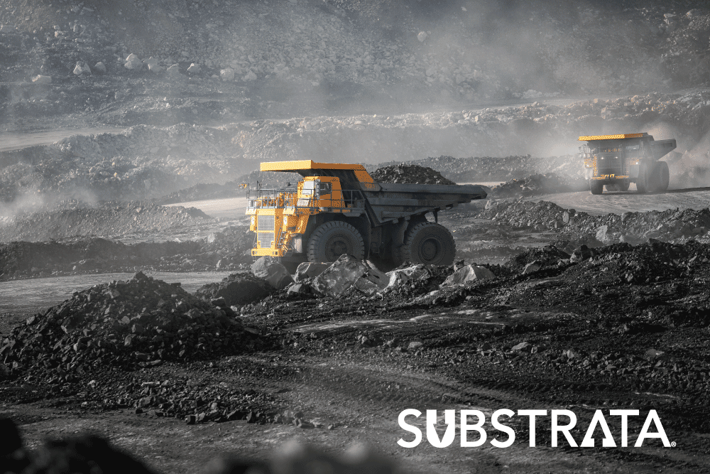 Haul truck traversing a mine road that needs dust control