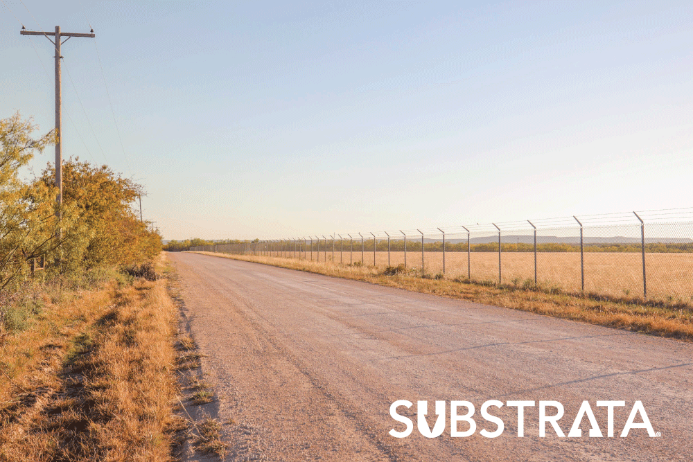 Unpaved gravel road using Perma-Zyme for dust suppression