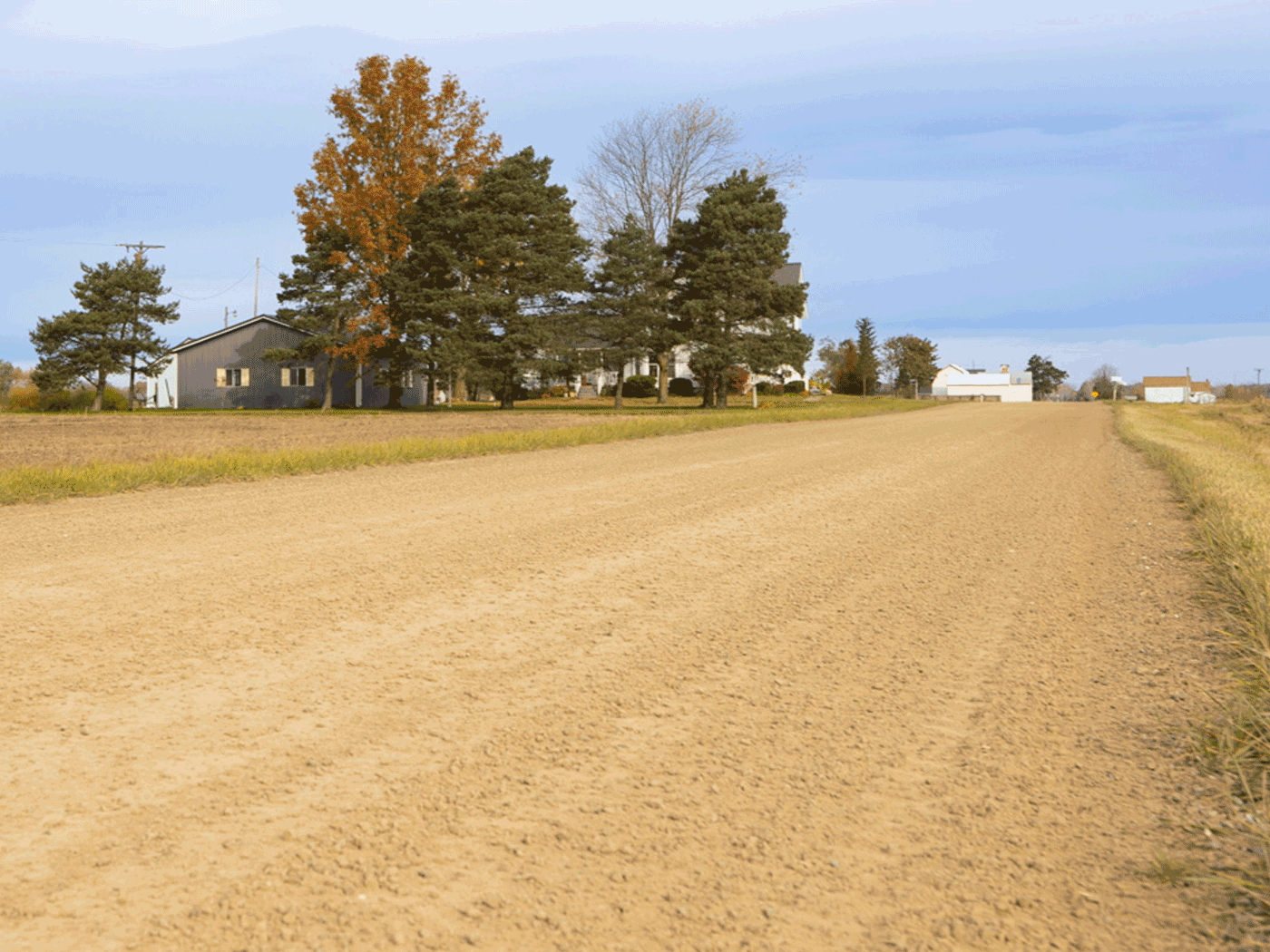 Straight-on view of completed Perma-Zyme stabilized road in Montrose Township