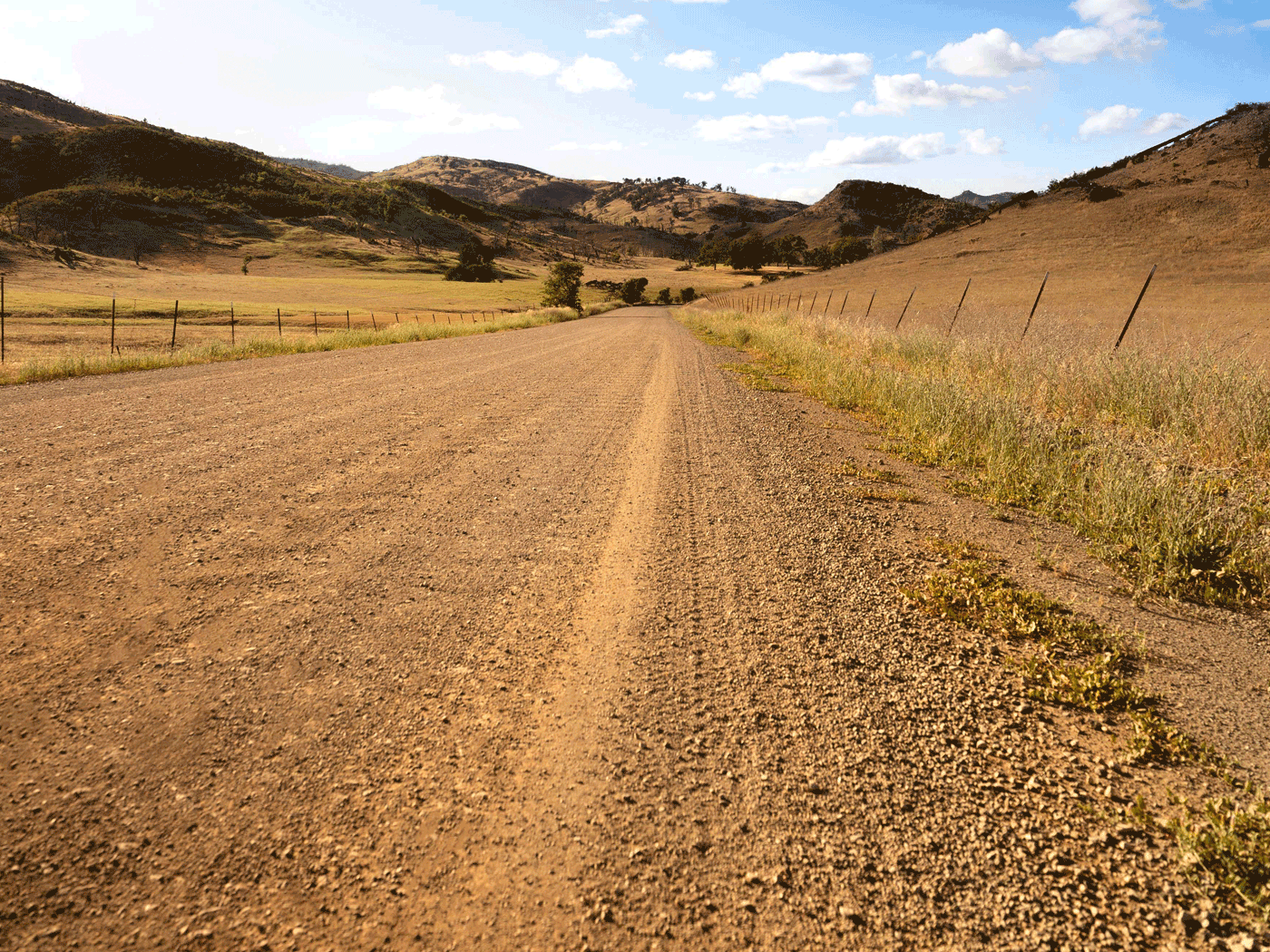 Straight view of completed Perma-Zyme stabilized road in Lake County