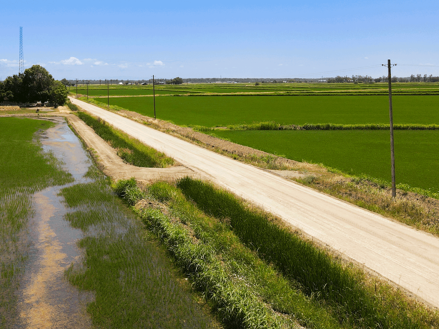 Side view showing completed stretch of Glenn County road treated with Perma-Zyme