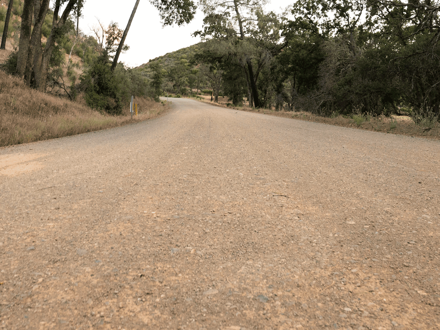 Alternate straight view showing completed stretch of Lake County road treated with Perma-Zyme