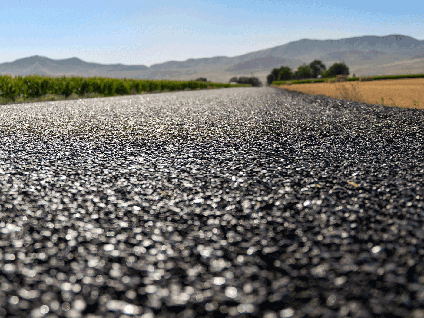 Close-up view of chipseal topcoat on Box Elder County road with Perma-Zyme subbase
