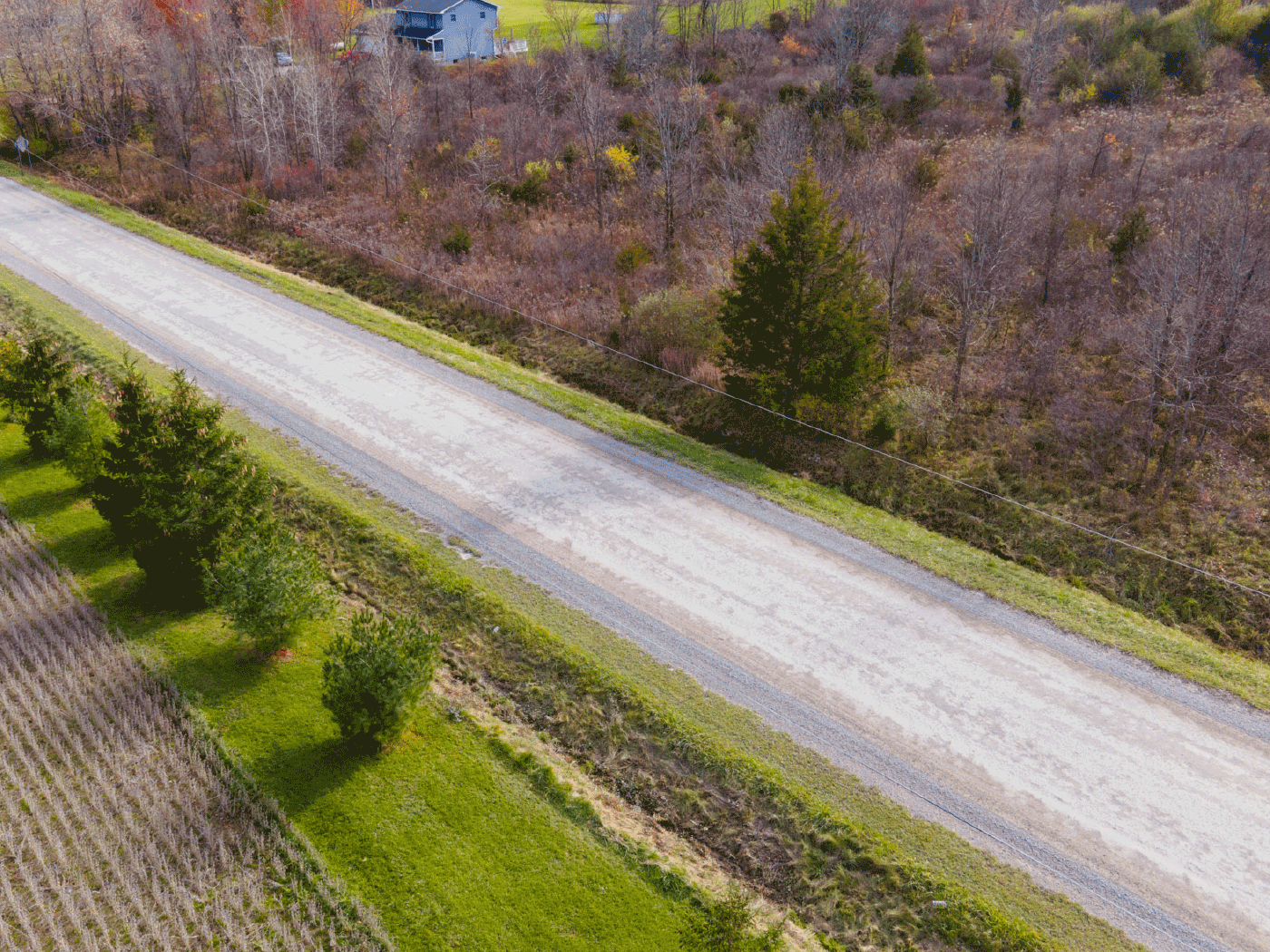Alternate aerial view of completed Perma-Zyme stabilized road in Flushing