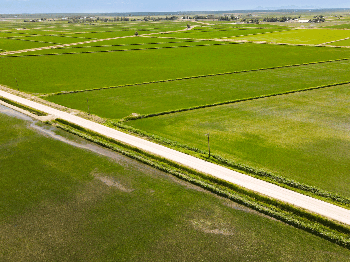 Aerial view of Glenn County road showing full road with Perma-Zyme treatment
