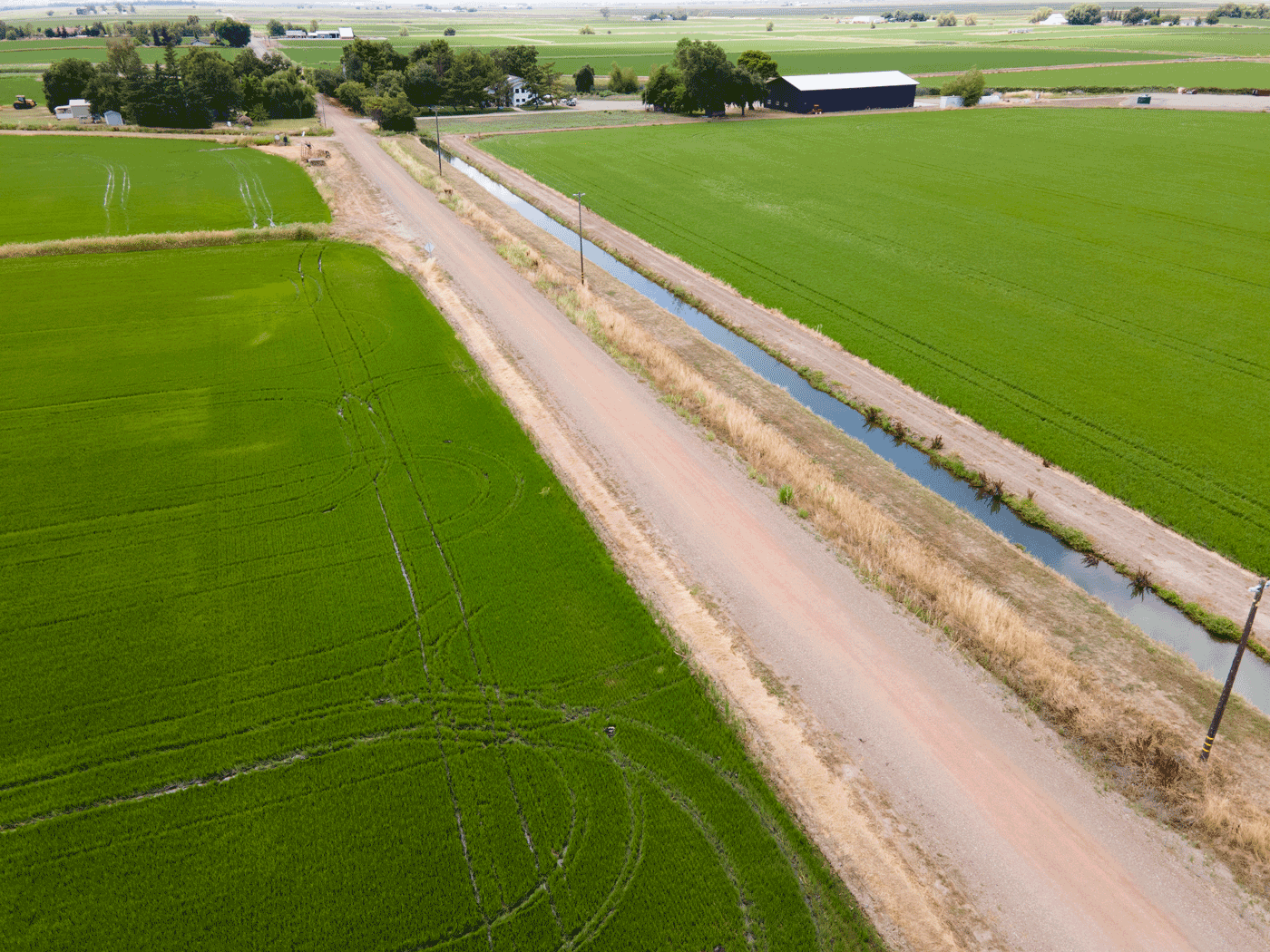 Aerial side view showing completed stretch of Princeton road treated with Perma-Zyme