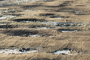 Potholes on a road